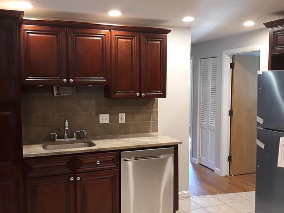 Stylish kitchen with new stainless appliances