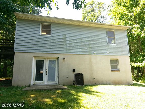 Back Exterior with Walkout from Lower Level