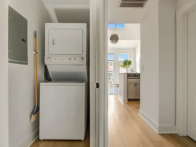 The washer dryer has been upgraded to a new Samsung after this photo was taken