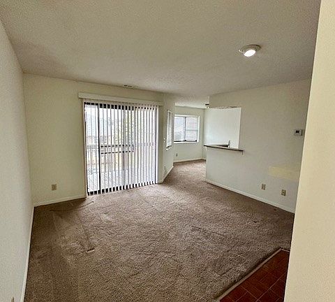 Living room of 2201 I- sliding glass doors to balcony