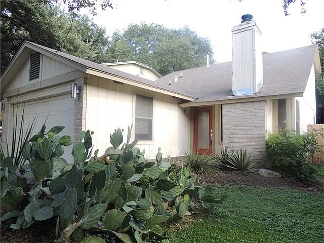 Exterior Front - Cactus garden is about to bloom awesome yellow flowers