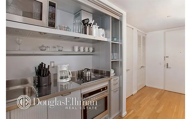 Sold by Douglas Elliman | media 11