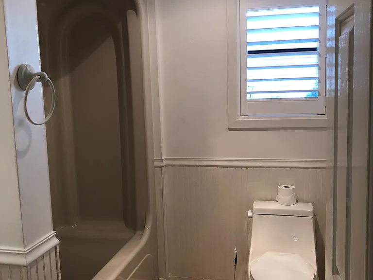 Second bedroom with shower/tub.