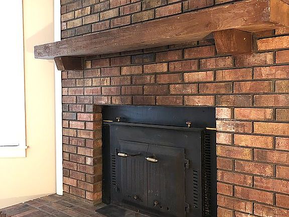 Raised hearth,custom mantle 