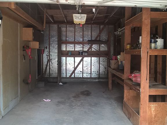 Garage; built-in shelving.