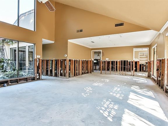 Great room looking into the kitchen and breakfast room.