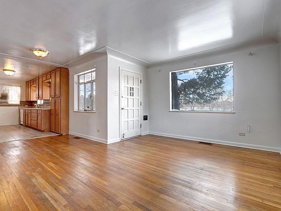 Bright kitchen + dinning open to living room.