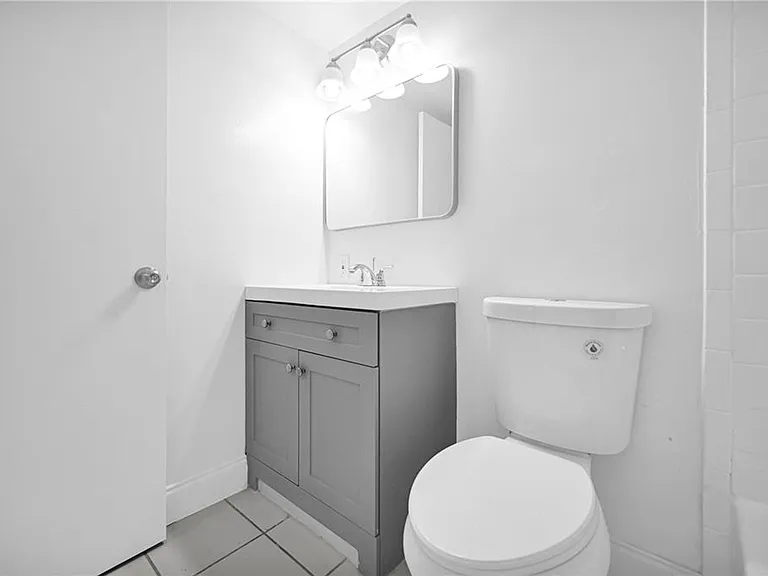 Colonial Village - 7550 Stirling Rd — Photo 10
