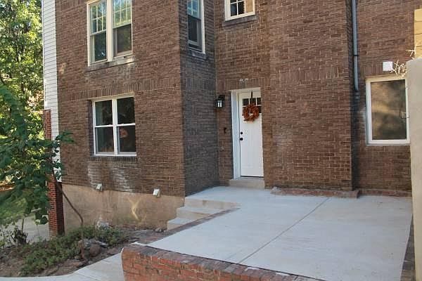 Private patio __ready for grilling, container gardening, or soaking in the sun!