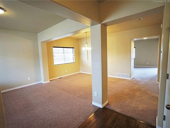 Formal Dining has decorative niche.