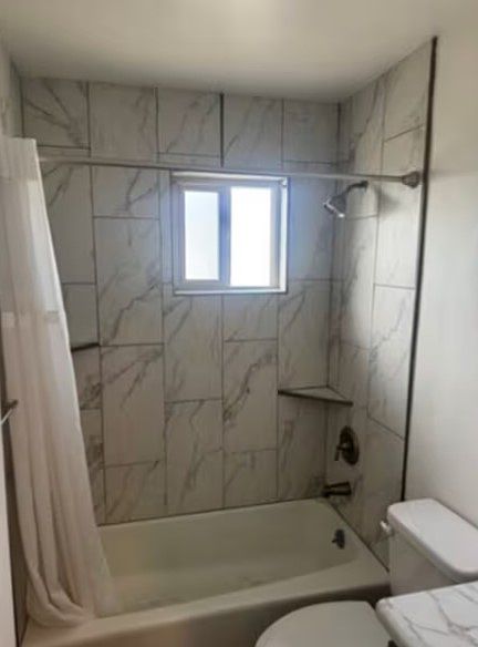 Bathroom with a shower tub.