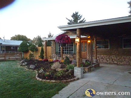 Majestic Stone w/ Montana Pinewood Poles, cedar fenced yard.
