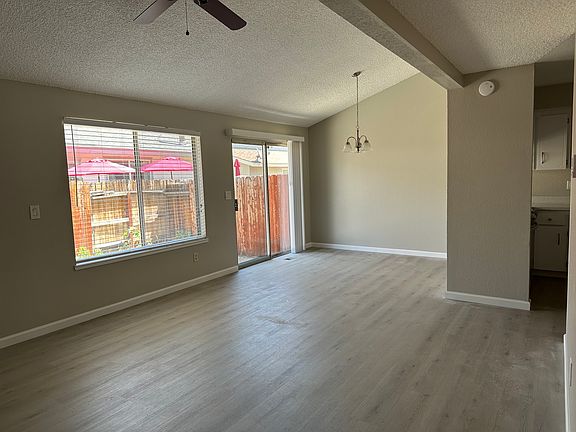 Living/Dining area with back yard view
