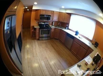 Beautiful Kitchen
						:
						Modern fixtures, Bamboo floors, wraparound granite counter