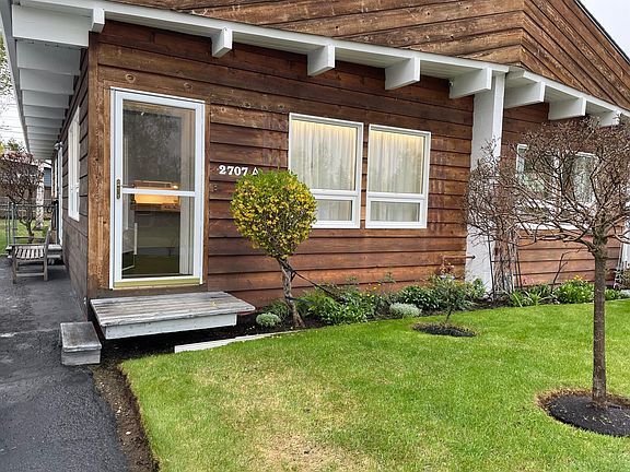 Rental side front door with screened arctic entry.