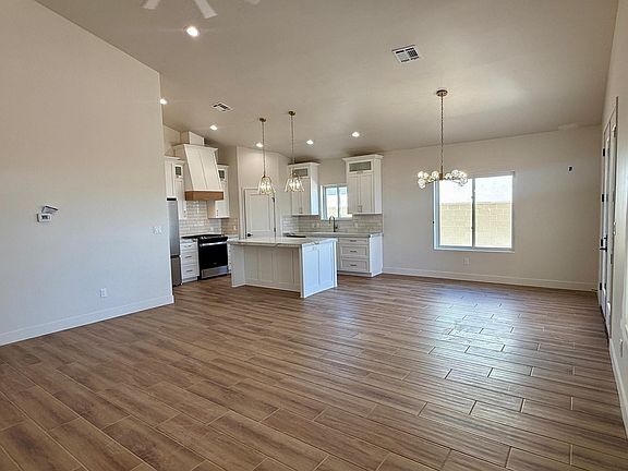 5th image of 10717 E 46th Pl