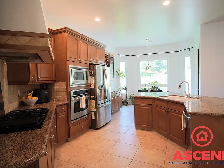 12510 Savonburg Dr — Photo 9