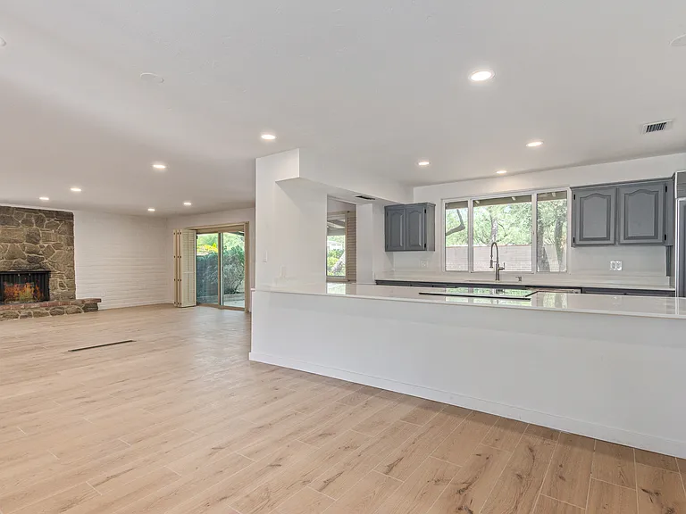 FORMAL DINING AREA WITH BREAKFAST BAR OR USE THIS SPACE TO FIT YOUR NEEDS