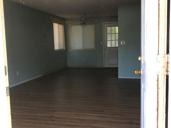 Living room open to dining room