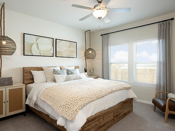 The luxurious primary suite is located on the first floor.