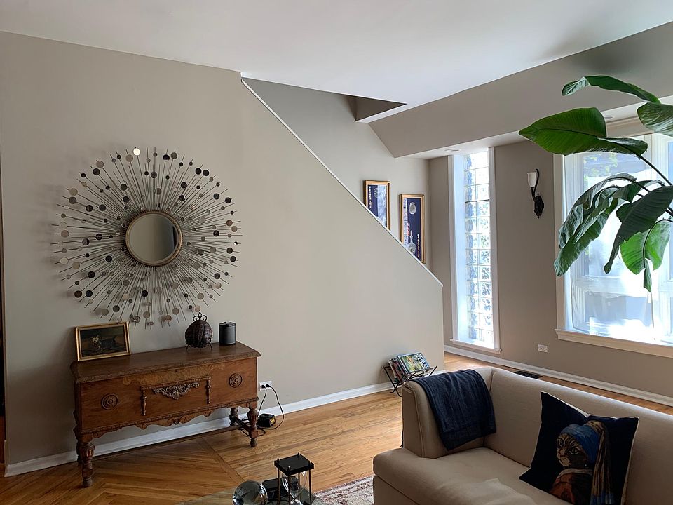 Living room with stairs.
