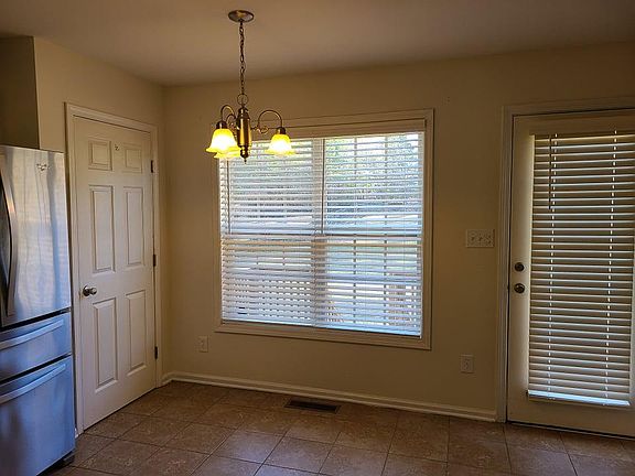 Eat in kitchen area and door to the deck and backyard