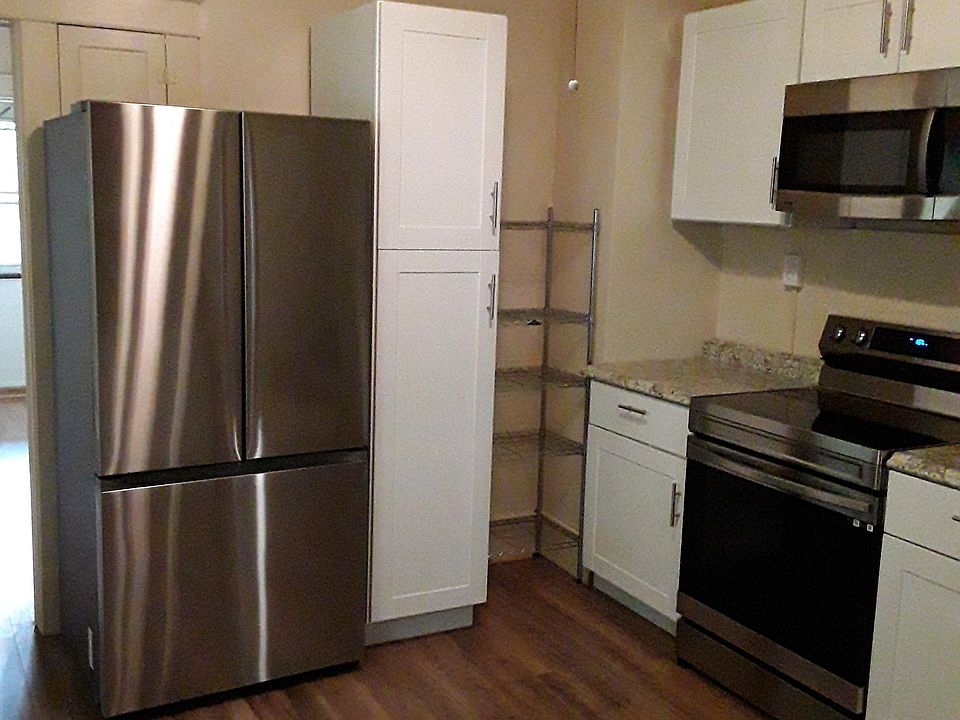 New Kitchen fridge and stove.