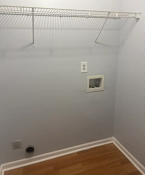 Laundry room upstairs in between the bedrooms for ease of access.