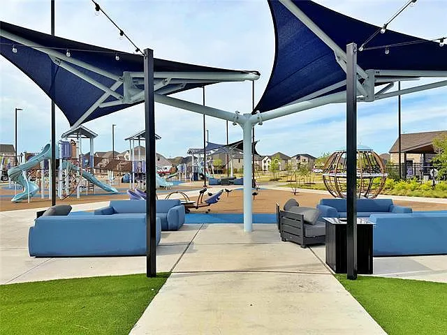 Enjoy premier community social spaces just steps away_perfect for meeting neighbors and family gatherings.