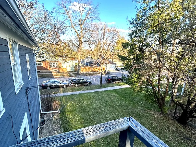 Outdoor space with neighborhood views and mature trees