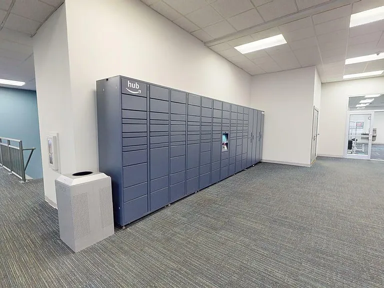 Modern communal area featuring sleek Amazon hub lockers, perfect for secure package storage and delivery convenience.