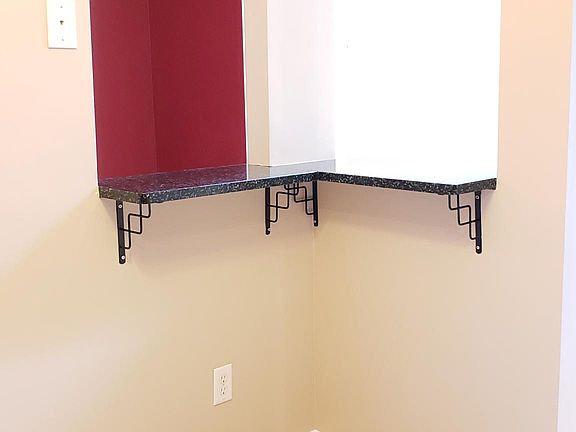 Breakfast bar open to dining and living areas