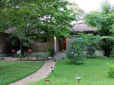 Street view of the three bedroom one bath section of the duplex.
