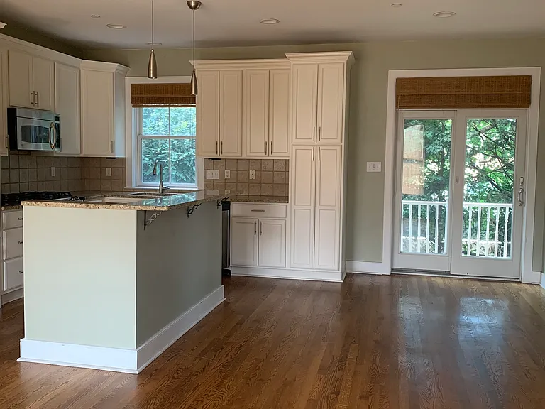 kitchen / dining / living space - sliding doors to deck