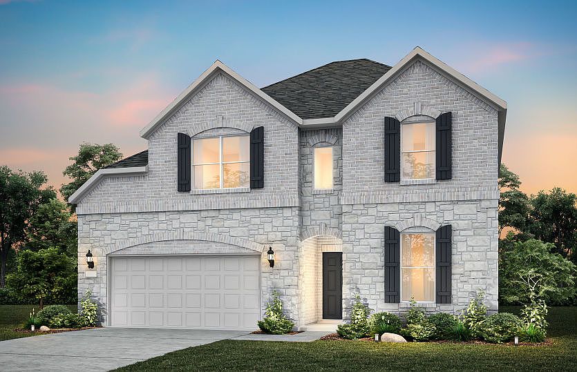The Wheeler, a two-story home with 2-car garage, shown as Home Exterior C
