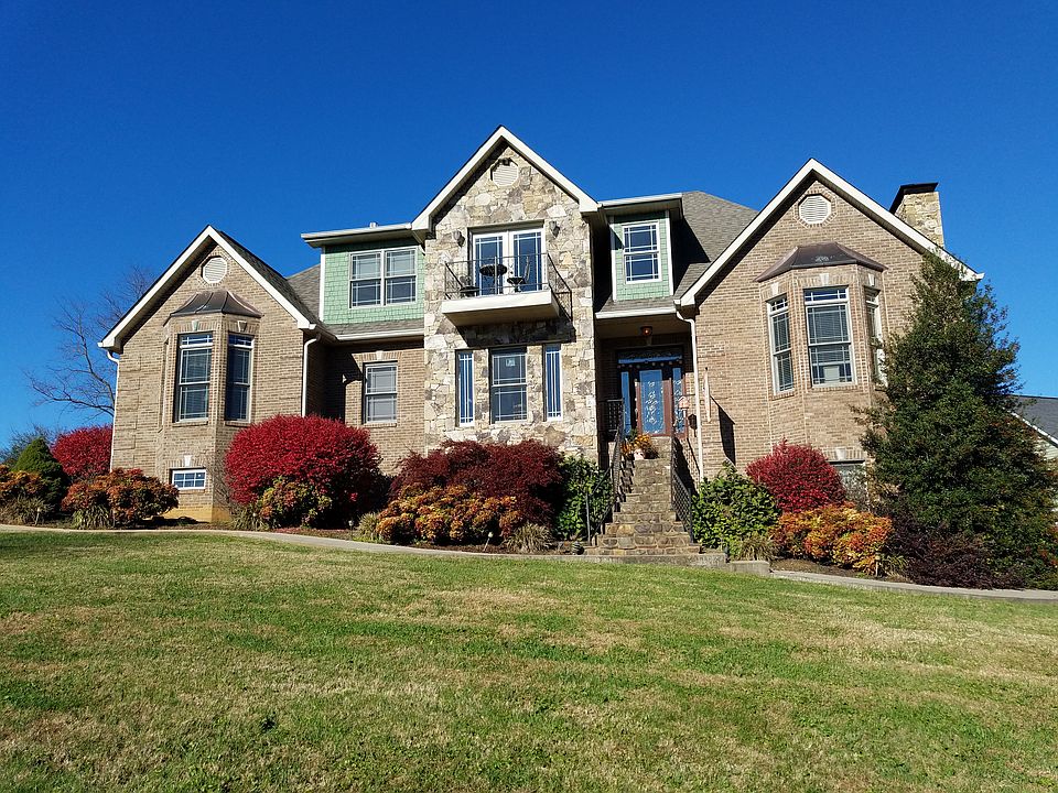 Front with Upstairs Balcony