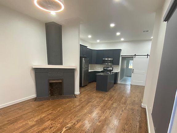 Large open floorplan with new hardwood floors