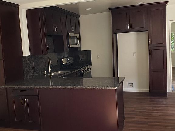 View of breakfast bar and pantry.