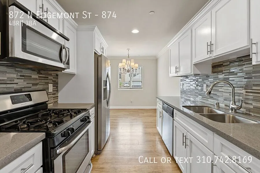 Spacious 4-Bed, 3-Bath House with 2 parking spots and W/D hookups — Photo 2