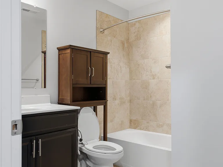 1st-floor bedroom with full bathroom