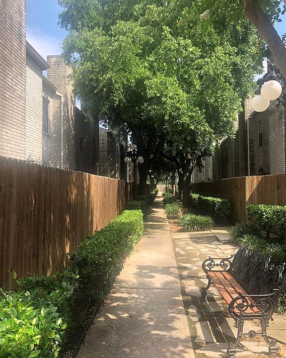 Serene Tree Lined Walkway to Unit 17495! The monthly lease includes water, trash, sewage and basic cable! Fridge, Washer, Dryer and pool access also included! Welcome Home!!