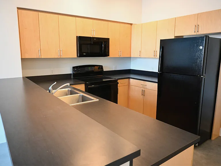 Black counter in a kitchen at The Sawyer.
