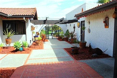 Spacious courtyard offers privacy with an outdoor feel.