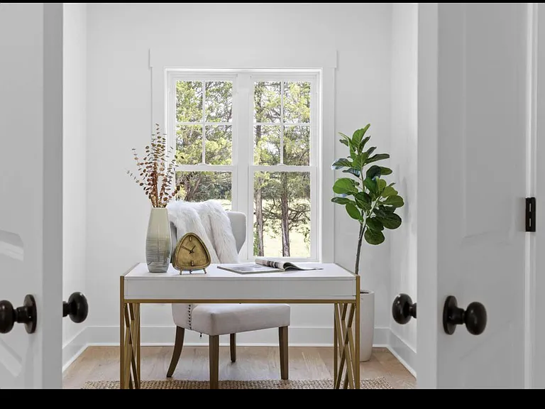 Private home office behind double doors.
