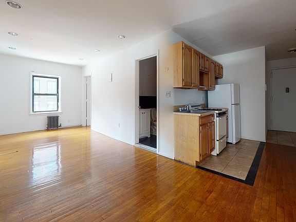 3rd image of 139 E 12th St APT 2B