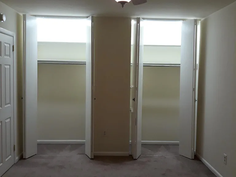 Double closets in master bedroom, with lights