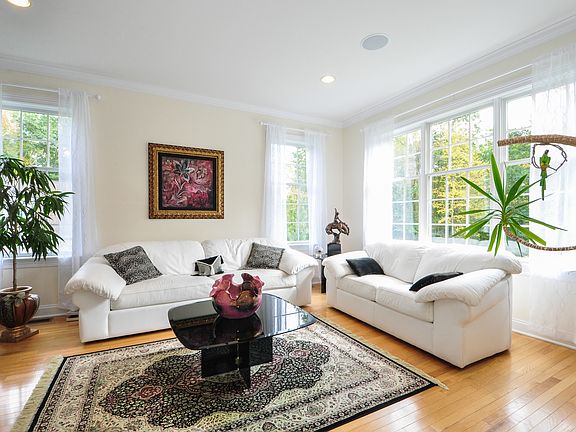Hardwood floors all over the living room area.