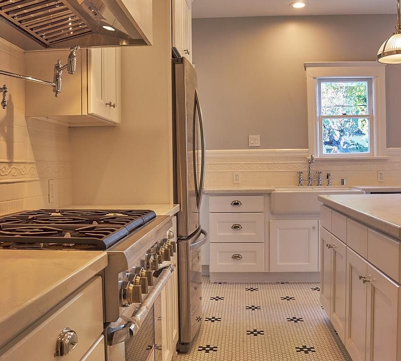 Stainless Appliances, Caesarstone Counters, Custom Tiling and