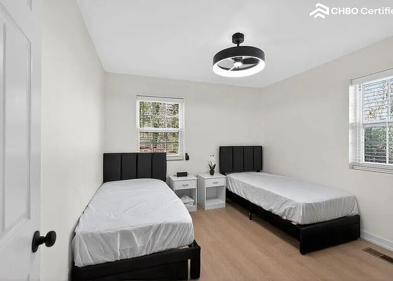A versatile second bedroom furnished