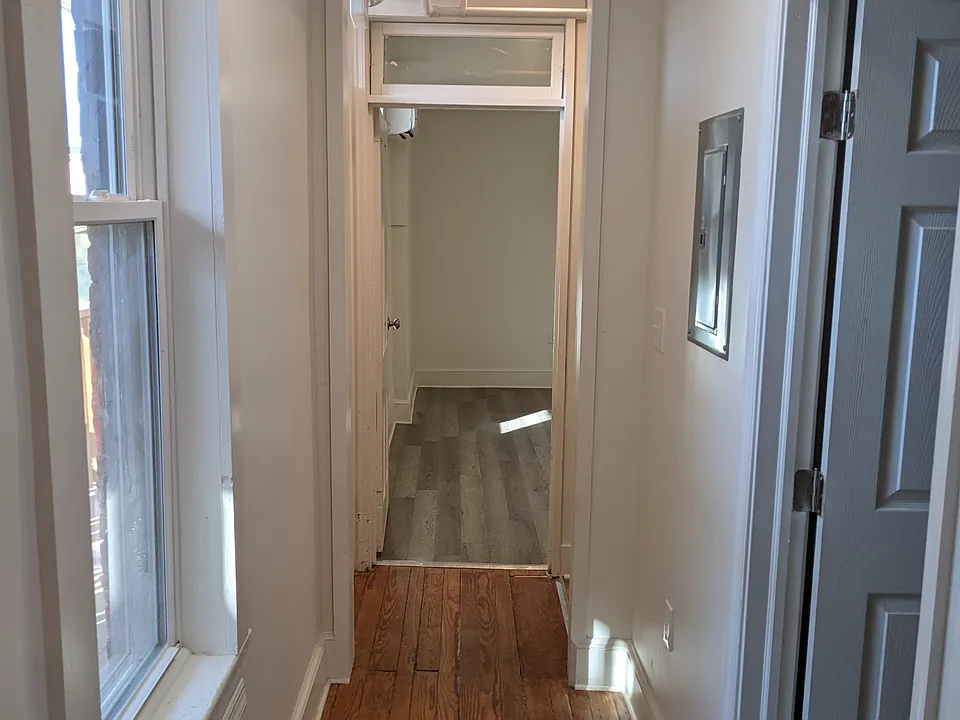 Hallway from living room to bathroom and bedroom